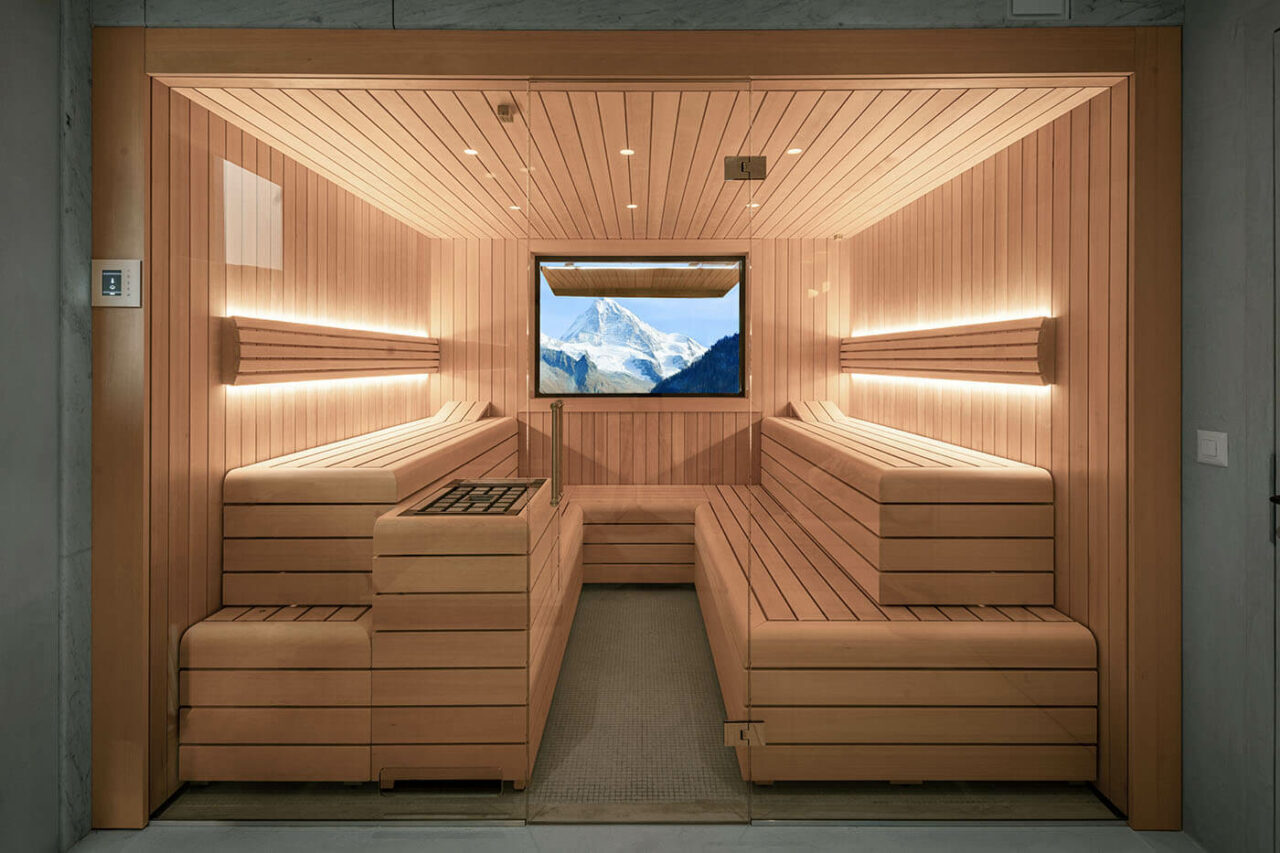 Design Sauna mit Außenfenster 3 Design Sauna mit Außenfenster. Sauna nach Maß: Moderne Sauna mit Glasfront in hellem Hemlock Holz.